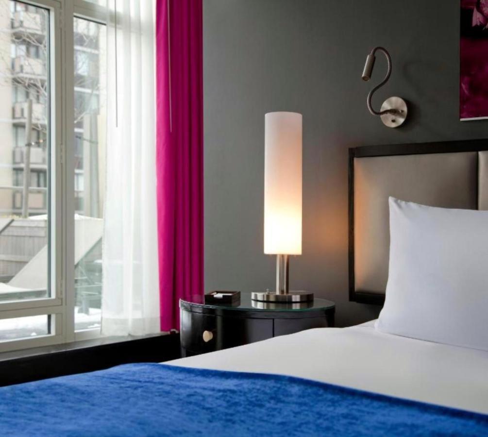 Hotel Royalton Park Avenue New York Exterior foto A bedroom at the Hotel Indigo